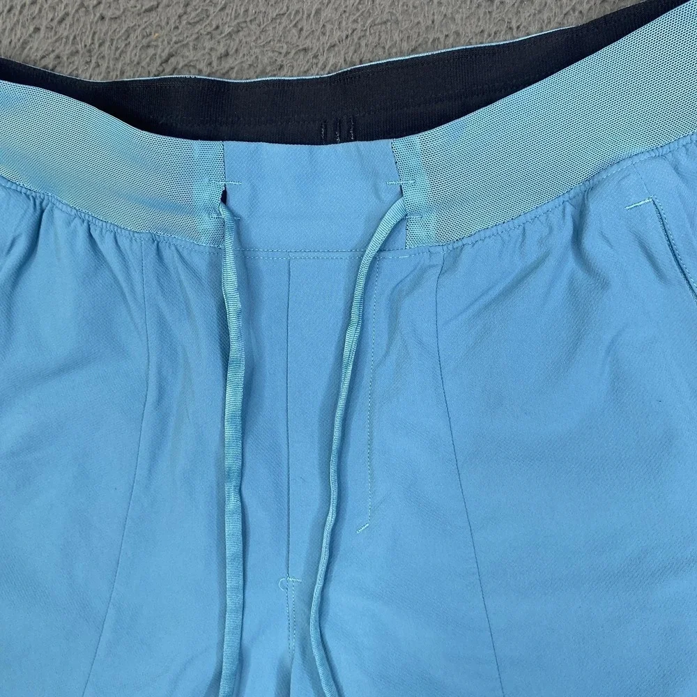 Lululemon License To Train LTT Shorts Mens Small Light Blue Zip Pockets Drawcord